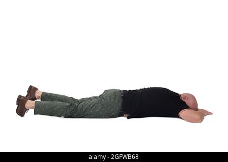 man lying on face down on white background Stock Photo