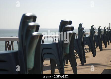 Stacked chairs at an empty cafe, Australia, Darwin Stock Photo