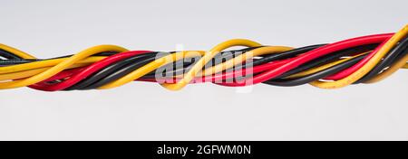 close-up of multicolored power computer wires on white background Stock Photo