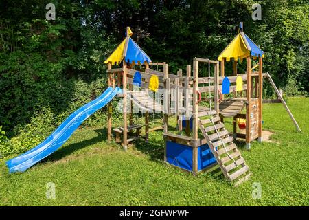 Climbing frame for children on a meadow in a park Stock Photo