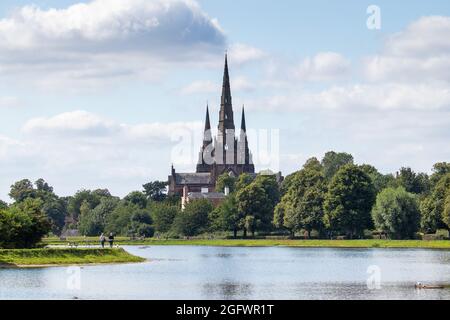 The view of Lichfield Cathedral from Stowe Pool showing the towers of the Cathedral. Lichfield Cathedral is a main tourist site in Staffordshire, UK. Stock Photo