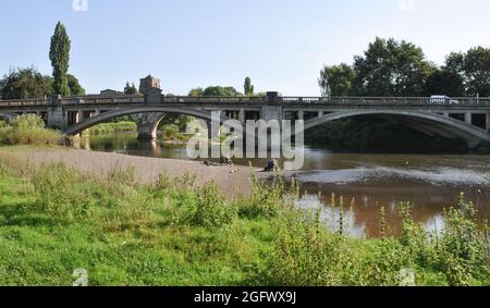 Atcham new bridge, opened in 1929, carries the old A5 (B4380) road over the River Severn and replaced the old bridge which still runs alongside. Stock Photo