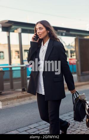 Smiling businesswoman on the phone Stock Photo