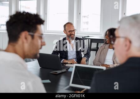 People talking during business meeting Stock Photo