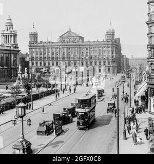 An early 20th century  view of Donegal Square, named after the Donegall family in the centre of Belfast, County Antrim, Northern Ireland. Left is Belfast City Hall, the headquarters of Belfast City Council. Stock Photo