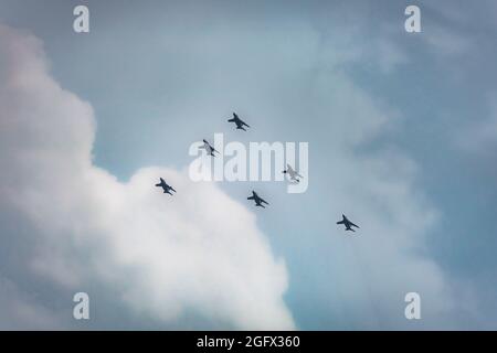 tokyo, japan - august 24 2021: Japanese aviation squadron of the Japan Air Self-Defense Force with blue impulse in delta formation flying in the sky o Stock Photo