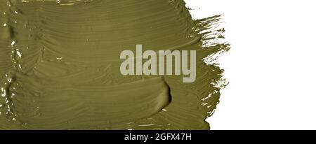 khaki green paint brush stroke on white background. banner copy space Stock Photo