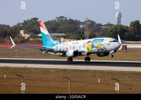 Luxair 'Sumo Artwork' livery Boeing 737-8C9 (Reg.: LX-LGU) arriving from Luxembourg. Stock Photo