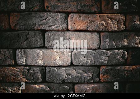 grungy bricks texture background. modern loft style rough texture. aged rough bricks wall template for text and design Stock Photo