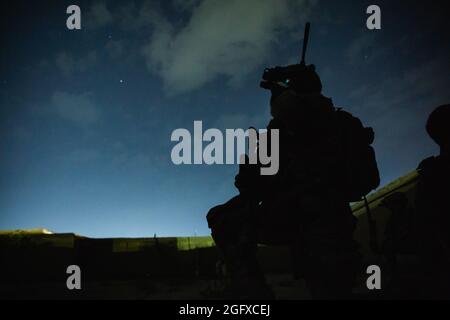 A U.S. special operations forces member conducts combat operations in ...