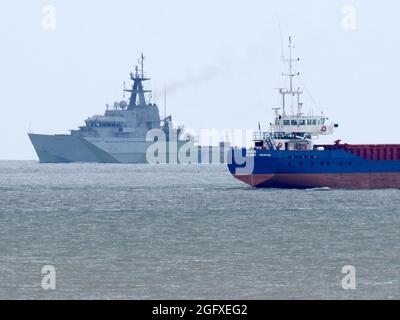 Sheerness, Kent, UK. 27th August, 2021. HMS Severn seen passing Sheerness, Kent this afternoon. The Royal Navy patrol ship has received a blue and green 'camouflage' paint scheme, the first ship to be painted this way since 1945. HMS Severn was decommissioned in 2017, but has been 'bought back from the dead' and is due to be recommissioned at a ceremony in London. Credit: James Bell/Alamy Live News Stock Photo