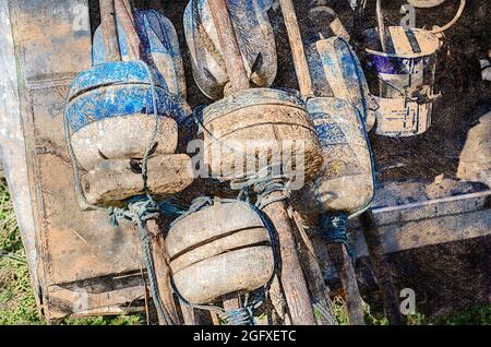 Buoys float for fishing nets. Old buoys for commercial fishing. Industrial fishing. Digital watercolor painting. Stock Photo