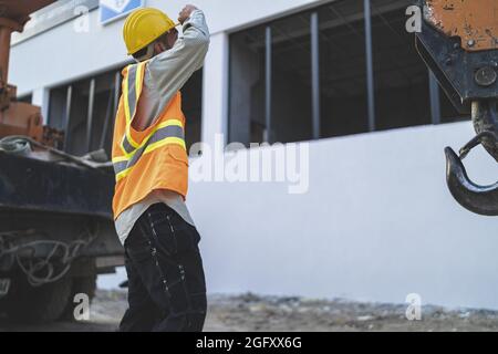 Closeup of the worker checking the machinery. Stock Photo