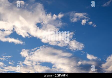 White clouds on a deep blue sky in summer Stock Photo