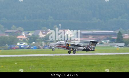Zeltweg, Austria SEPTEMBER, 6, 2019 Military plane landing in an airport in the Alps. SAAB 105 of Austrian Air Force Stock Photo
