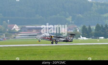 Zeltweg, Austria SEPTEMBER, 6, 2019 Training military jet airplane with special livery landing. SAAB 105 of Austrian Air Force Stock Photo
