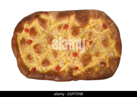 sponge cake of egg cream, pine nuts and cherries on white background Stock Photo