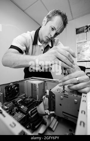 Computer Cpu Fixing A vertical grayscale shot of a processor Stock Photo - Alamy