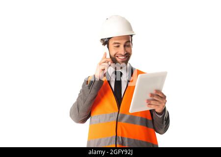 Engineer talking on cellphone and holding digital tablet isolated on white Stock Photo