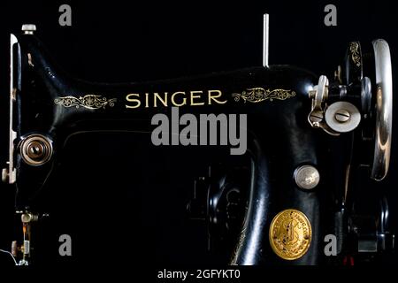 Singer 99k vintage sewing machine. Classic portable sewing machine close up. Stock Photo