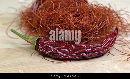Chilli threads and chilli pod in a close-up Stock Photo