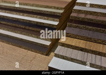 Samples of fibreboard panels with wood texture. Laminated CPD. Chipboard PVC edge. Wooden furniture CMD and MDF. Stock Photo