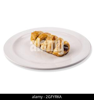Closeup of a stuffed braid bread on a plate isolated on white background Stock Photo