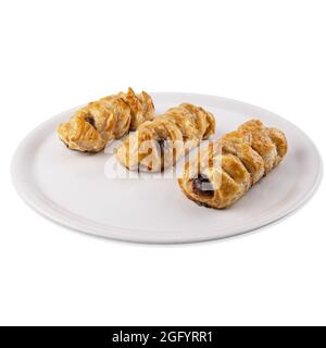 Closeup of a stuffed braid bread on a plate isolated on white background Stock Photo