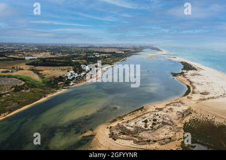 Aerial view of Praia da Fabrica, also known as Praia de Cacela Velha beach, a sandy barrier island at the mouth of the Ria Formosa in the Algarve regi Stock Photo