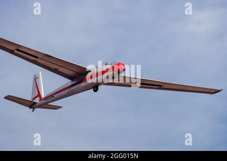 A Let Blanik L-13 two-seat training glider comes in to land at an airport in Alomogordo, New Mexico. Stock Photo