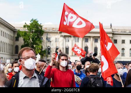Berlin, Germany. 27th Aug, 2021. People attend an election rally of the Social Democratic Party (SPD) for Germany's federal elections in Berlin, capital of Germany, on Aug. 27, 2021. One month before federal elections in Germany, the Social Democratic Party (SPD) caught up with the conservative union (CDU/CSU), according to the Politbarometer published by public broadcaster ZDF on Friday. Credit: Stefan Zeitz/Xinhua/Alamy Live News Stock Photo