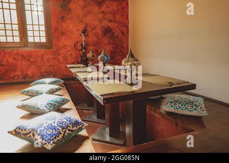 Low dining clearance table with pillows