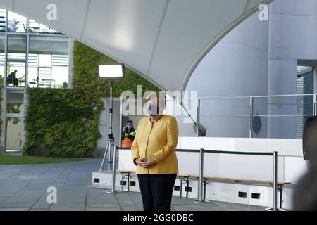 Berlin, Germany. 27th Aug, 2021. Berlin: Chancellor Angela Merkel shortly before the conference on the “G20 Compact with Africa (CwA)” in the courtyard of the Federal Chancellery. (Photo by Simone Kuhlmey/Pacific Press) Credit: Pacific Press Media Production Corp./Alamy Live News Stock Photo