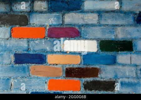 Rainbow colourful brick wall background. brick wall texture with colorful blocks Stock Photo