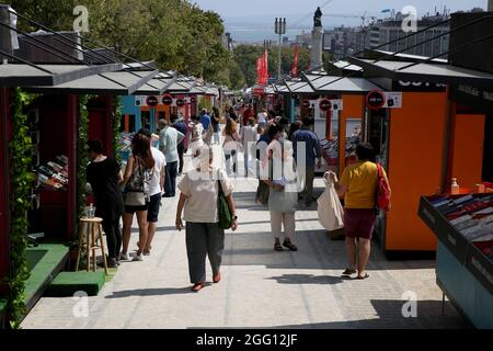 Lisbon, Portugal. 27th Aug, 2021. People visit the Lisbon Book Fair 2021 in Lisbon, Portugal, Aug. 27, 2021. The 91st edition of the Lisbon Book Fair kicked off on Aug. 26 with COVID-19 prevention and control measures. Credit: Pedro Fiuza/Xinhua/Alamy Live News Stock Photo