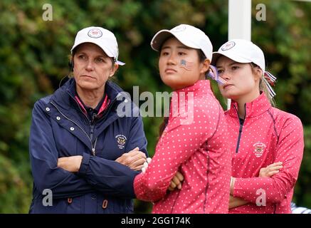 Team USA's Captain Sarah Ingram watches with Gina Kim and Brooke Matthews during the 2021 Curtis Cup Day 1 - Morning Foursomes at Conwy Golf Club, Con Stock Photo