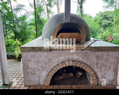 Pune , India - 20 February 2021, View of Baking Traditional Tandoor Or Oven at Pune Maharashtra Stock Photo