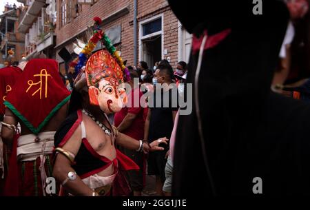 2nd August 2021. Bhaktapur, Nepal. A traditional masked dancer performs in the Nil Barahi dance festival at Bode, Thimi, Bhaktapur. Stock Photo