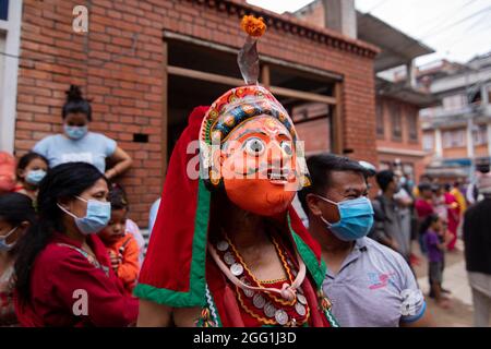 2nd August 2021. Bhaktapur, Nepal. A traditional masked dancer performs in the Nil Barahi dance festival at Bode, Thimi, Bhaktapur. Stock Photo