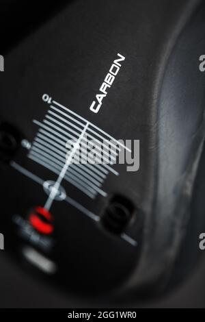 Composite product made of carbon fiber with the inscription CARBON and a distance scale. Macro, close-up Stock Photo