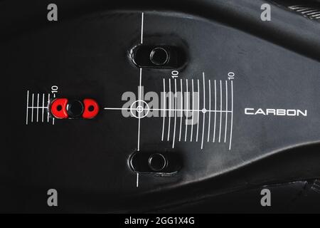Composite product made of carbon fiber with the inscription CARBON and a distance scale. Macro, close-up Stock Photo