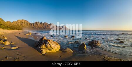 View of the Kogelberg Mountains from Kogelberg beach along Clarence Drive between Gordon's Bay and Rooi-Els. False Bay. Western Cape. South Africa Stock Photo