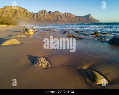 View of the Kogelberg Mountains from Kogelberg beach along Clarence Drive between Gordon's Bay and Rooi-Els. False Bay. Western Cape. South Africa Stock Photo