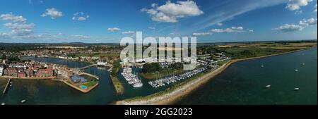 Panoramic view of Emsworth Yacht Harbour Marina full of Yachts and Sailing Boats at this popular sailing destination in Southern England. Aerial. Stock Photo