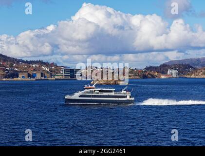 One of the small Jet Powered Catamaran Passenger Ferries that covers the various Townships in the Fjords around Bergen. Stock Photo