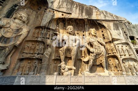 Longmen Grottoes with Buddha's figures are Starting with the Northern Wei Dynasty in 493 AD. It is one of the four notable grottoes in China. Stock Photo