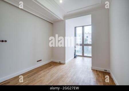 empty white room with repair and without furniture with panoramic windows Stock Photo