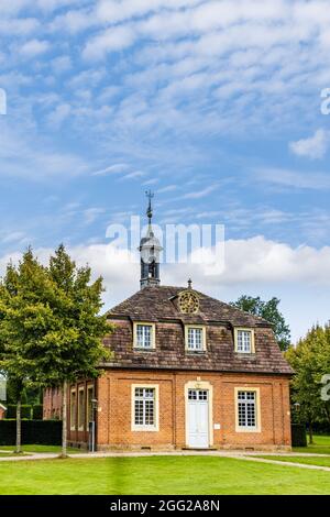 Sogel, Germany - August 25, 2021: Landscape with chapel of hunting castle Clemenswerth in Sogel Lower Saxony in Germany Stock Photo