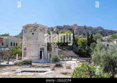 Athens, Greece. Tower of Winds or Aerides on Roman Agora, Famous tourist attraction, Ancient Greek ruins in the city center, Plaka district. Sunny day Stock Photo