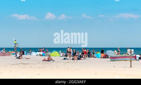 Hel, Poland - 08.01.2021: The big beach, duza plaza in Polish, full of people on a nice sunny summer day at the Baltic coast. Summer vacation by the Stock Photo